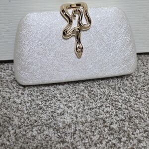 Elegant White Clutch with Gold Accent